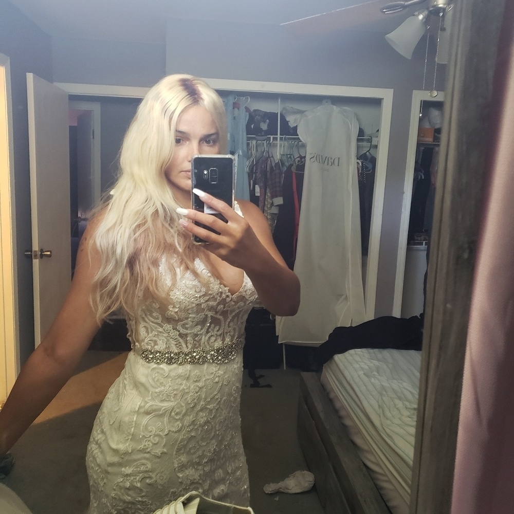 A size 12 Galina wedding gown.